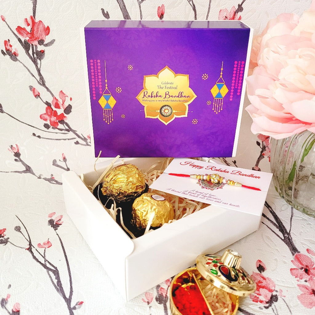 A simple & small Rakhi Set With Greetings & Chocolates