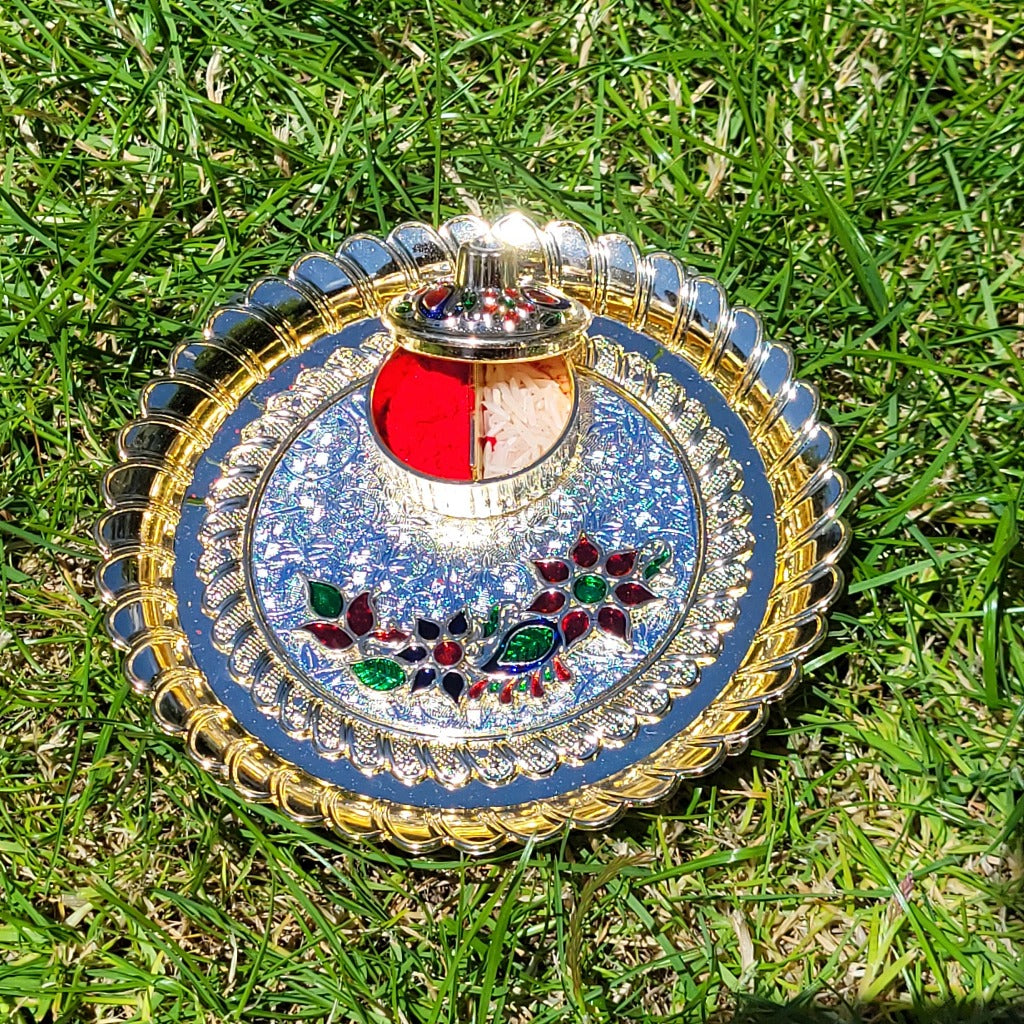 Thali with kumkum and Rice Dibbi