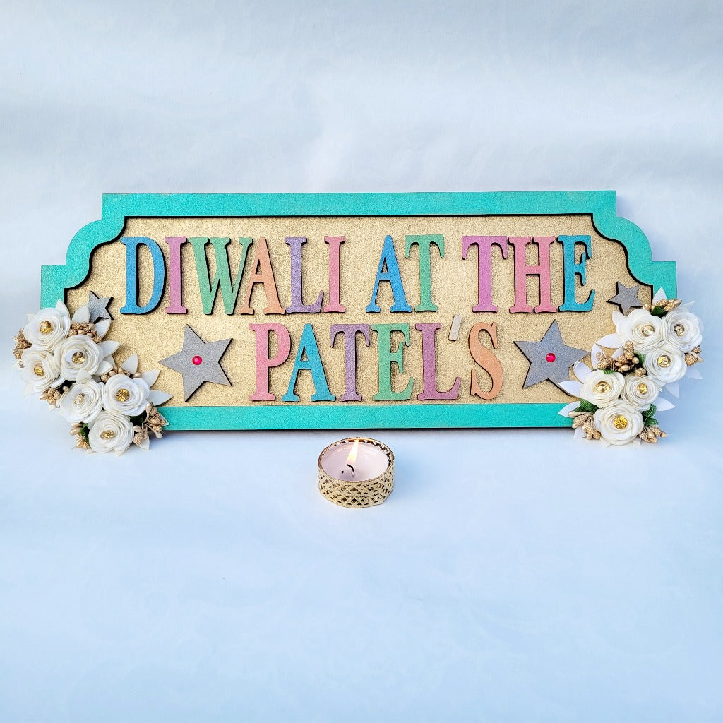 Colourful Personalised Diwali At The .. sign with floral finishing for Diwali decoration and gift