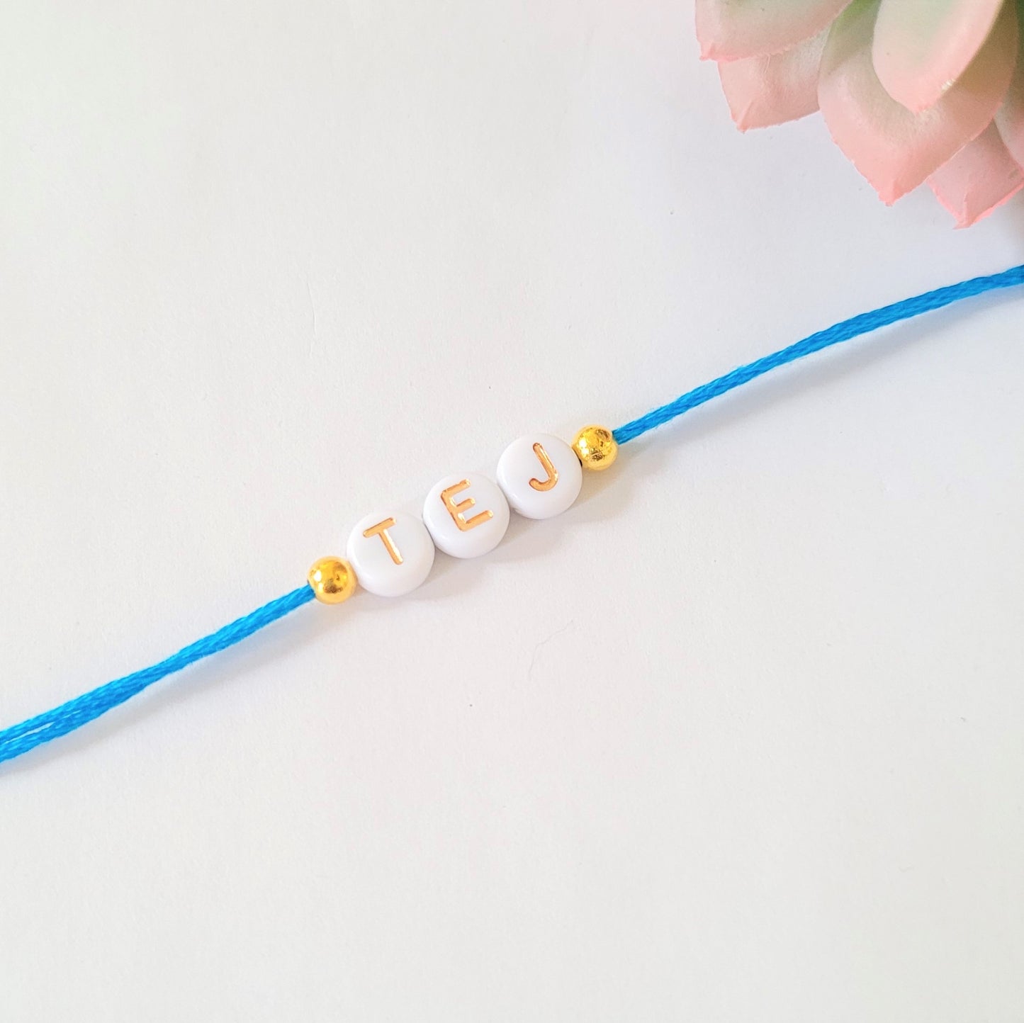 Personalised Rakhi/Rakhri, Raksha Bandhan, Gold and White Letter Beads