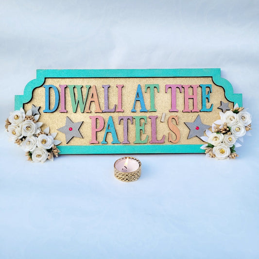 Colourful Personalised Diwali At The .. sign with floral finishing for Diwali decoration and gift